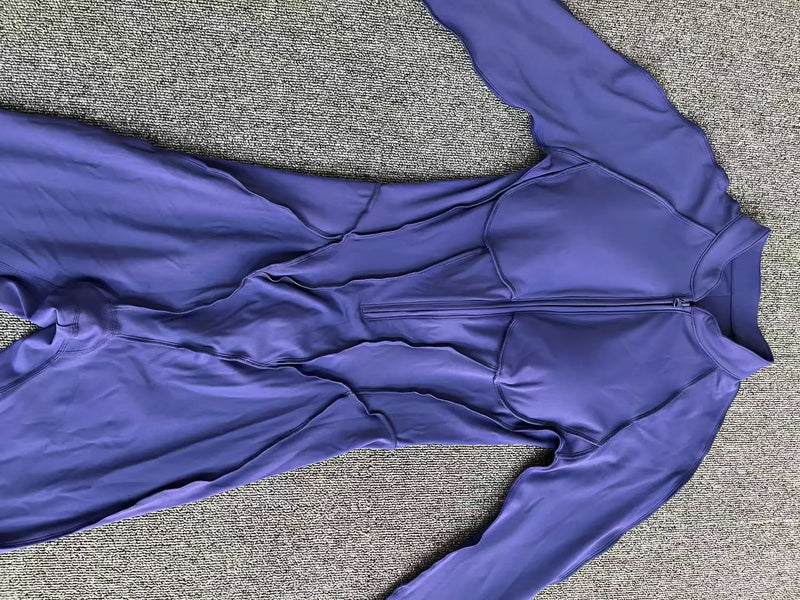 2025 Women's One-piece Yoga Jumpsuit leggings Zipper Nylon Long-sleeved Sexy Backless Slim Fit Sports Outfit with chest pad